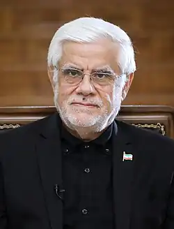 Headshot of Aref in 2017