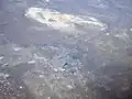 Air photo with the park at top and the town of Monahans below center