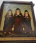 A monumental icon of the three saints.
