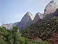 Mountain of the Sun (centered) seen from SW with Twin Brothers (right)