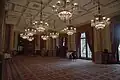 The former Reading Room, The National Liberal Club, this is on the first floor and served the Gladstone Library accessible through the end door on the left, the door on the right leads to the secondary staircase that links all floors in the building, note the vents in the ceiling for the mechanical ventilation system, the walls as well as the columns are clad in faience, the light fittings are not the originals