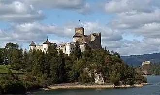 Niedzica Castle with the Czorsztyn Castle ruins in the background
