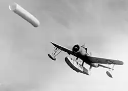US OS2U Kingfisher following a towed target sleeve