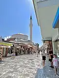 View from the street in 2022, including the finished minaret