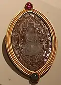 Castellani golds, made in imitation of the ancient in part by incorporating original materials, 19th century, brooch with a Gothic style cameo