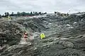 Closeup view of emergency reinforcement (concrete over rocks) on emergency spillway (February 19)