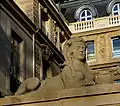 One of the sphinxes above the door