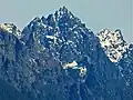 Merchant Peak centered, with the southeast subsidiary subpeak (5,831 ft) to the right. The subpeak is mistakenly labelled as Merchant Peak on old USGS maps.