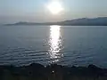 The Zemplínska Šírava reservoir from the shore in Jovsa, Medvedia hora peninsula seen in distance