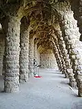 Colonnaded footpath under a viaduct