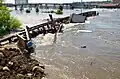 Debris piled up on the Victoria Bridge in Minot