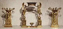 Centerpiece between two candelabra; by Pierre-Philippe Thomire; circa 1810; probably gilded bronze; Calouste Gulbenkian Museum (Lisbon, Portugal)