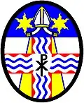 Christ Church Cathedral (Canada): Argent, a pile reversed entire [=throughout] truncated at chief or edged azure overall a cross gules surmounted by a cross wavy argent ...