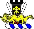 Crest of 184th Ordnance Battalion, USA: From a wreath argent and azure, a castle sable charged with a fleur-de-lis or surmounted by two machetes pilewise handle and hilt gules, blades argent, overall an oriental dragon passant or.
