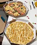 Frango com catupiry pizza and a Brazilian interpretation of a Margherita pizza