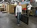 Use a portable work platform and adjust it to the height of the worker.