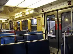 Original MI 79 interior showing flip-down seats by doors