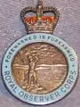 Post-1953 lapel badge worn with civilian clothing (pre-1968 badges were hallmarked sterling silver; later versions were cast metal).