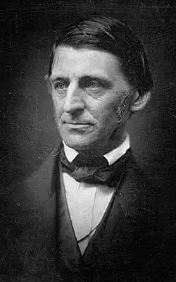 A black-and-white photograph of a middle-aged man in a suit.