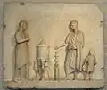Ritual vessel supported on a tripod (Roman relief 1st-century AD)