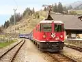 A train runs through Langwies