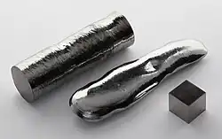 Rhenium single crystal, a remelted bar, and a 1&nbsp;cm3 rhenium cube for comparison