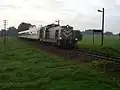 Tourist train at a disused train stop (2012)