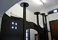 screen (modern?) in passageway to stair