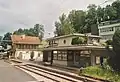 old and new station buildings in 2000