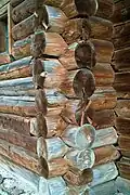 Cabin log constructions with residues