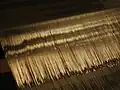 The gold threads used in the brocade