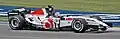 Takuma Sato driving the BAR 007 with "Racing Revolution" logo at the 2005 United States Grand Prix.