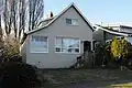 Although much altered, 3045 64th Ave SW in the Alki neighborhood is almost certainly Seattle's oldest residential building. It is believed to have been built by Doc Maynard in 1860.[64]