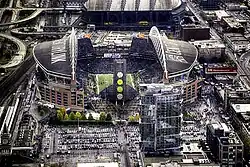 Aerial view of Lumen Field with fans in it