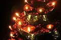 Oil lamps are burnt during the annual urs festival