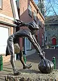 Sjalotje pulls out the siepel, symbol of carnival in Ootmarsum.
