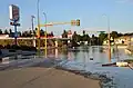 Shortly after water overtopped levees in Minot. Also, dikes protecting infrastructure.