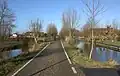 Narrow street with wide canals