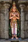 A Vaishnava devotee in namaste posture