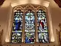 Stained glass from Herkenrode in the east window of the Church of St Giles, Ashtead, Surrey, England