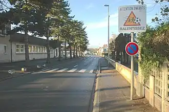 The eastern road into the village