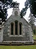 Stained glass windows and belfry.