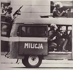 Units of the Citizens' Militia and ZOMO race to disperse crowds of protesters.
