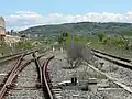 The junction at the southern end of the station, on the left continuing towards Chiusi and on the right towards Monte Antico.