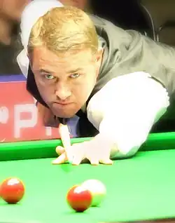 Stephen Hendry playing a shot