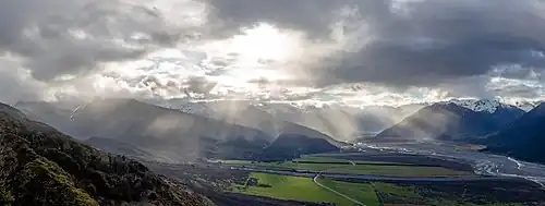Stormy sunset over Waimakariri River basin, New Zealand