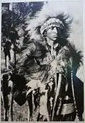 Then Tafari Makonnen wearing a warrior's dress