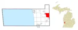 Location within Ottawa County (red) and an administered portion of the Lamont CDP (pink)