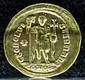 Coin of Theodosius II (425–429), showing the emperor with globus cruciger and with the same vexillum