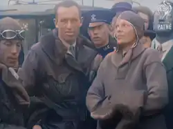 Members of the seaplane "Friendship", who flew from Trepassey, Newfoundland and arrived in Burry Port on the 18th of June 1928.From left to right they are, Wilmer Stultz (pilot), Louis Gordon (mechanic and co-pilot), Amelia Earhart (commander). Photo taken outside the Fricker's metal works, Burry Port.